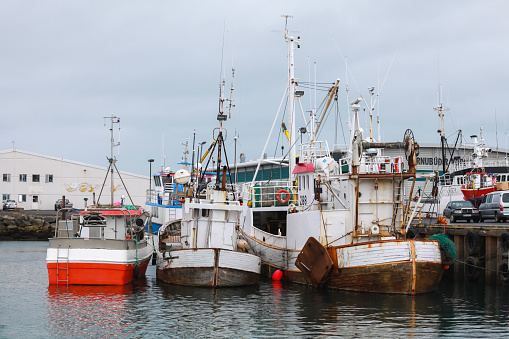 Hafnarfjordur, Iceland - April 4, 2017: Fishing boats are moored in Hafnarfjordur harbour. It is a small port town located on the southwest coast of Iceland