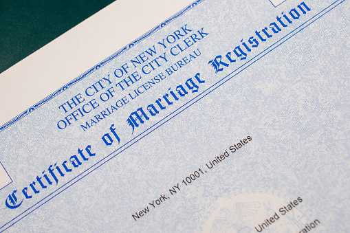 A USA certificate of marriage registration is an official document that legally confirms the marriage of a couple in the United States. It includes essential details such as the names of the spouses, the date and location of the marriage, and may be used for various legal and administrative purposes.