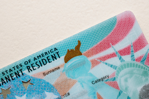 A Green Card, also known as a Permanent Resident Card, is a crucial document for immigrants to the United States of America. It signifies lawful permanent residency and allows individuals to live, work, and travel within the country. This card is a fundamental component of the emigration and immigration process, facilitating access to work opportunities and tourist experiences in the USA.
