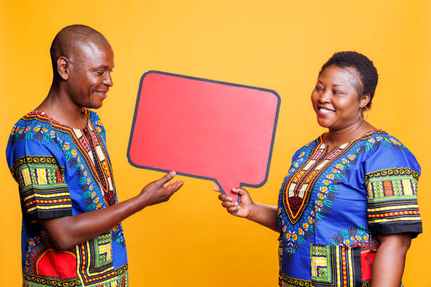 istock Couple holding red speech bubble mockup 1718495136
