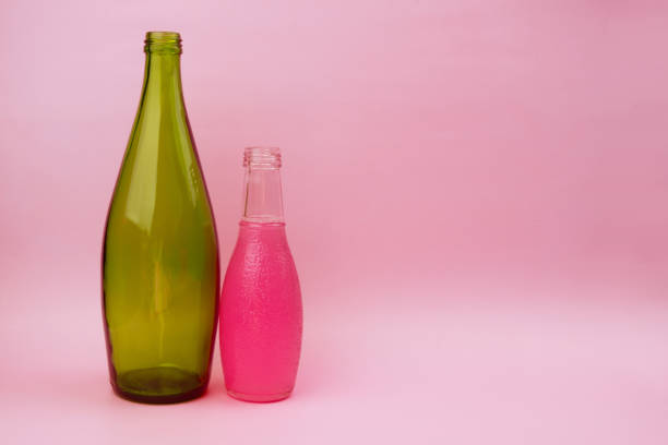 istock Colorful glass bottles, unusual background 1718500096