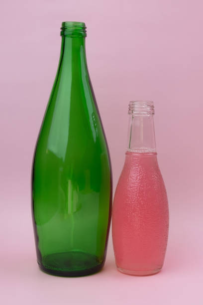 istock Colorful glass bottles, unusual background 1718501180