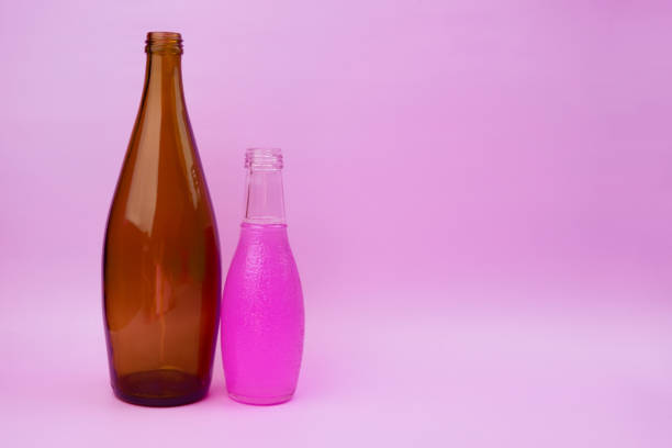 istock Colorful glass bottles, unusual background 1718502912