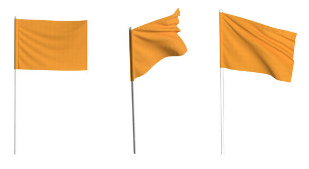 istock Orange Flag waving in the wind on flagpole. Isolated flag 1718505185
