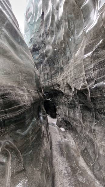 istock Ice tunnels with shattered glacier rocks 1718508511