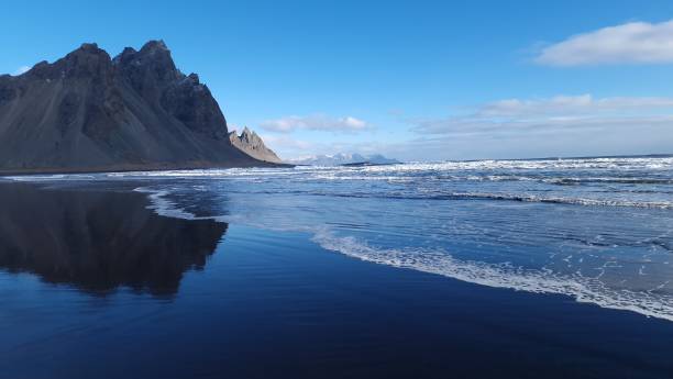 istock Huge vestrahorn mountains and ocean 1718510632
