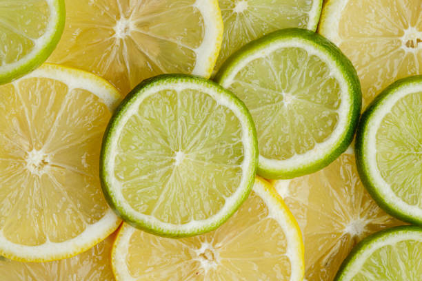 Citrus fruit of lime slices background