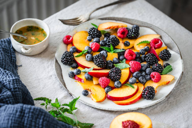 istock Close-up of healthy fruit salad for breakfast served on table 1718516616