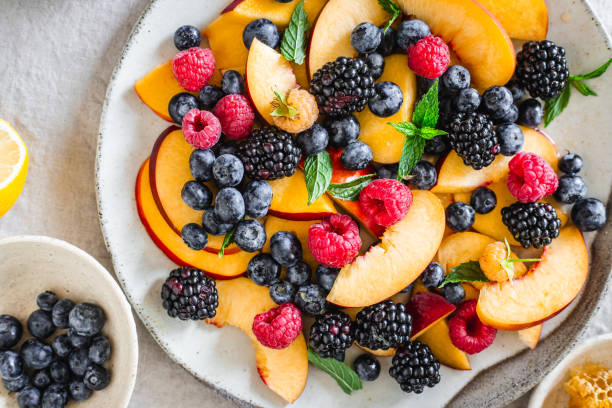 istock Close-up of freshly prepared fruit salad served on table 1718516617