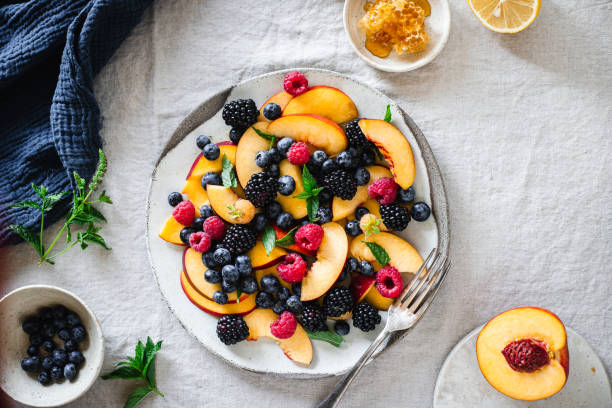 istock Top view of healthy fruit salad breakfast served on table 1718516618