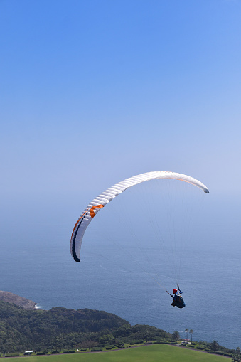Paragliding in cloudy weather.