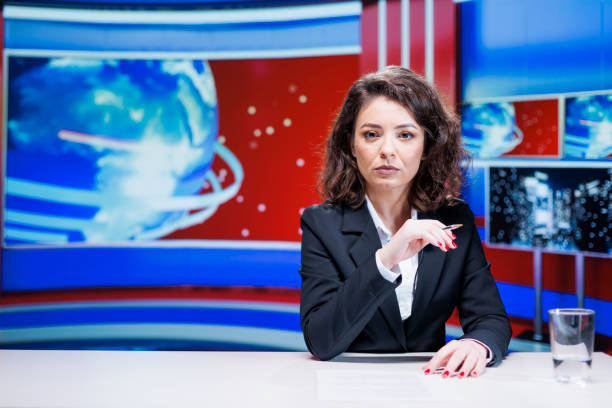 istock News anchor presenting latest topics 1718573075