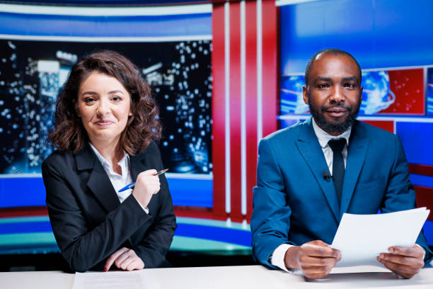 istock Journalists team reporting live news 1718585182