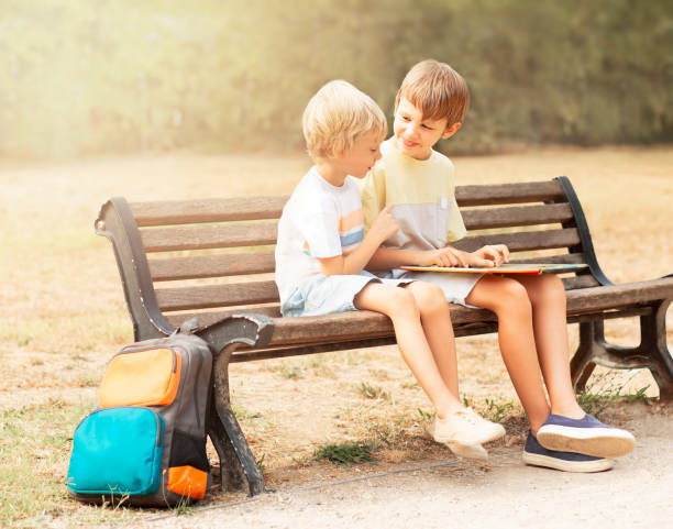 Boy Studying on School Steps