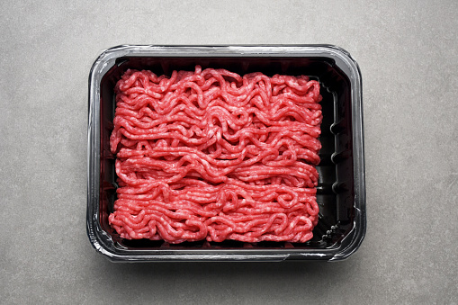 Directly above ground beef, minced meat in a plastic package