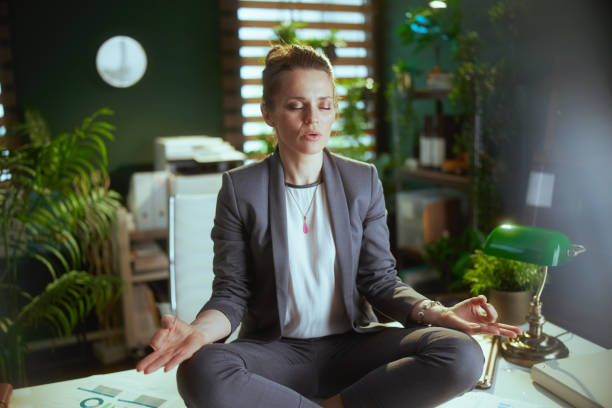 istock relaxed modern small business owner woman at work meditating 1718686742