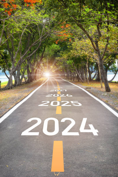 istock 2024 to 2028 on asphalt road surface 1718690139