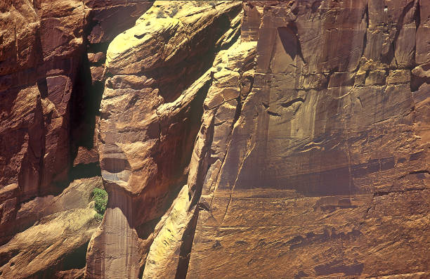 Canyon de Chelly National Monument, Arizona, USA - steep rock cliffs in the canyon in ochre, yellow and red hues