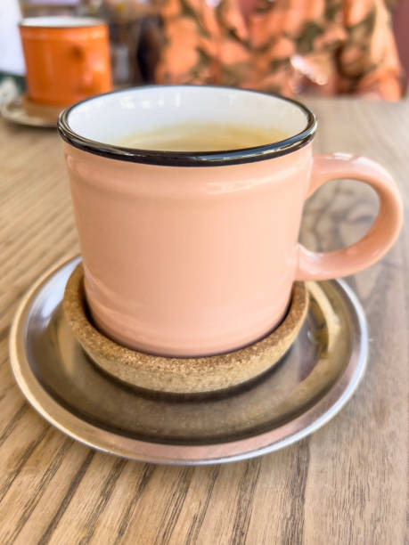 istock cup of coffee on wooden table in a cafe 1718700089
