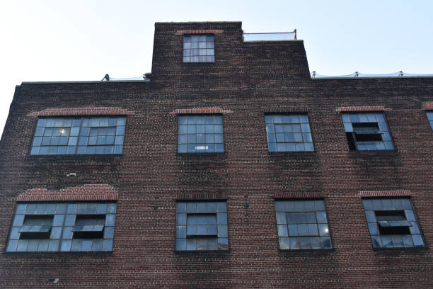 istock Building facades with windows, modern architecture, cityscape scenery 1718731444