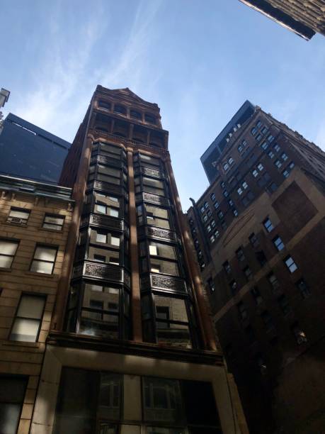 istock Building facades with windows, modern architecture, cityscape scenery 1718751889