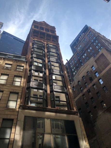 istock Building facades with windows, modern architecture, cityscape scenery 1718751894