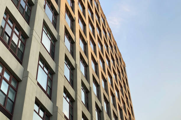 istock Building facades with windows, modern architecture, cityscape scenery 1718756378