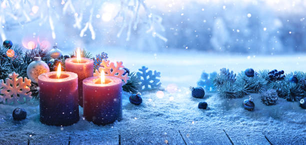 istock Winter Forest Landscape With Burning Candles 1718760238