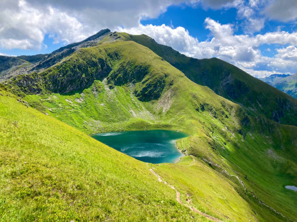 istock A heart-shape lake embedded in the mountains 1718765832