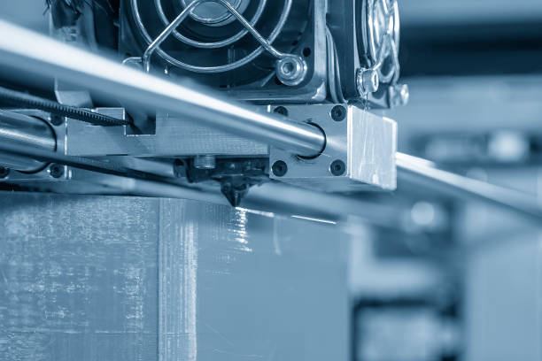 istock Close up scene the additive manufacturing by 3D printer machine. 1718774181