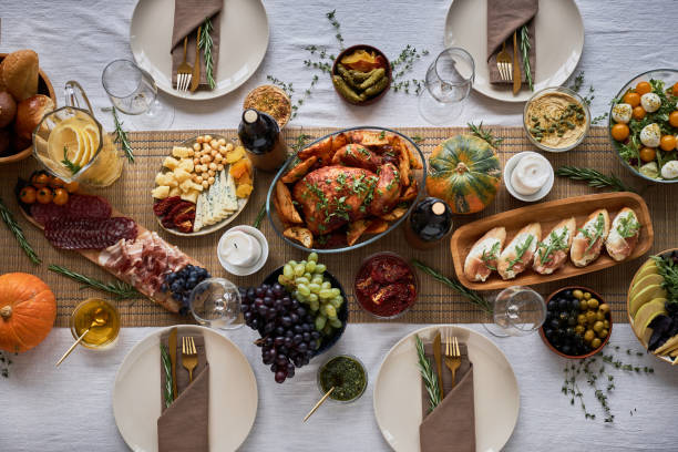 istock Top view festive dinner table with delicious rustic turkey dishes 1718782068