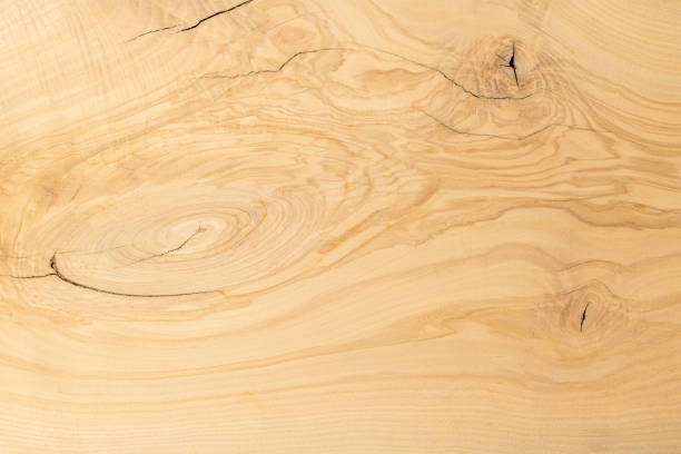 istock Abstract background of natural oak panel with dark knots and cracks 1718803385