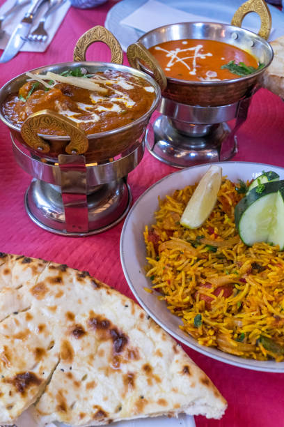 istock Biryani rice, bread and Indian sauces 1718813942