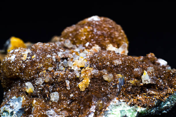 istock Yellow smithsonite crystal isolated on black surface macro with plenty of detail. Selective focus 1718814480