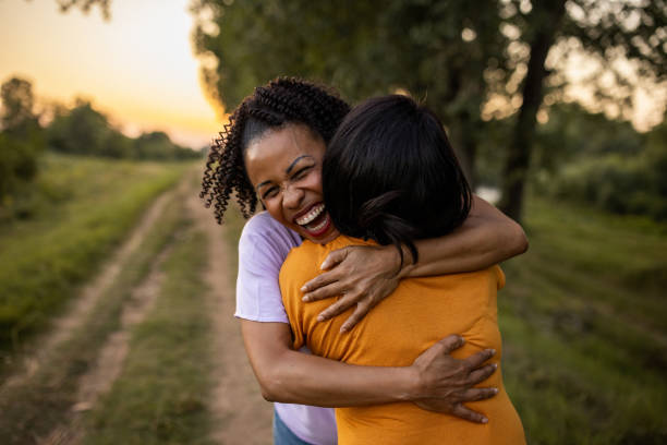istock Mom and daughter hugging 1718824014
