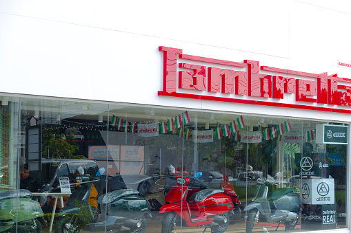 Facade and window of Lambretta electric motorcycle shop in Bangkok seated at Wanghin Road at shopping area Plaza Lagoon.