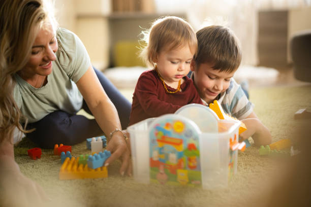 istock Family playing whit toy blocks at home 1718917584