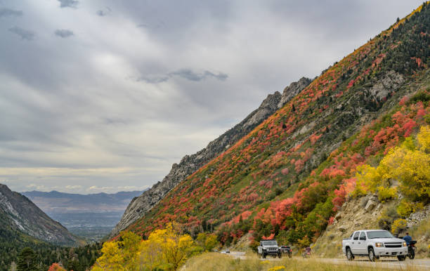 Salt Lake City, United States – September 26, 2007: Landscape of Salt Lake City outskirts with mountains, cars and former Cottonwood Mall
