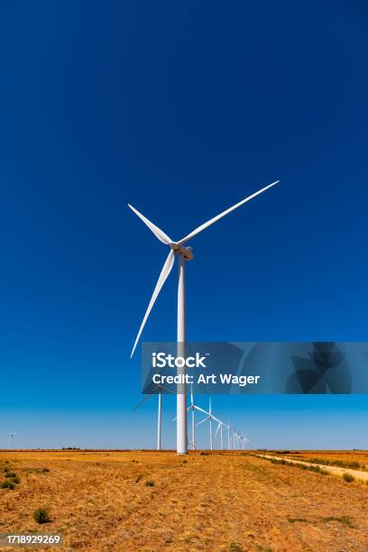 Wind Turbines In Central Texas Stock Photo - Download Image Now - Wind Turbine, Diminishing Perspective, Technology