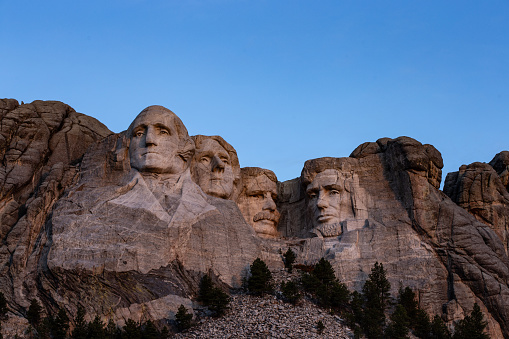 The busts of Presidents George Washington, Thomas Jefferson, Teddy Theodore Roosevelt, and Abraham Lincoln carved Borglum into the Black Hills of South Dakota at Mount Rushmore