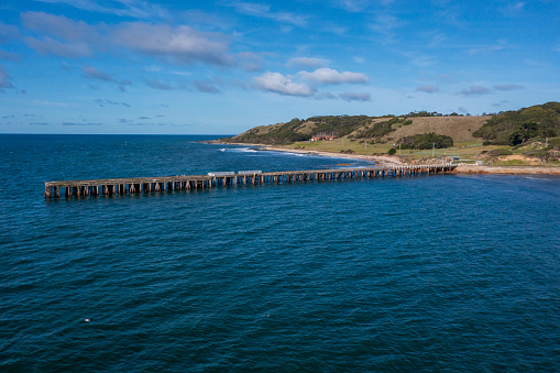 Drone aerial photograph of the Naracoopa Jetty on King Island in Tasmania in Australia