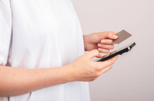istock Paying online using smartphone and credit card. Internet payment concept 1718989380