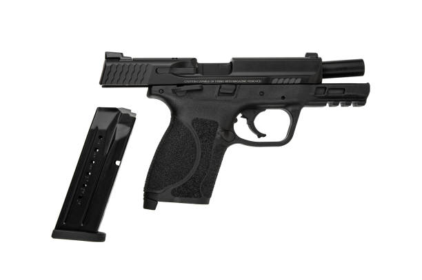 istock Modern semi-automatic pistol isolate on a white background. Armament for the army and police. Short-barreled weapon. 1719000693