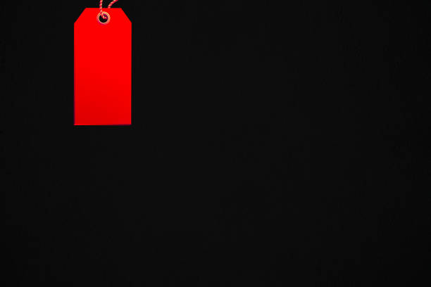 istock Illustration of red paper tag on black background 1719004775