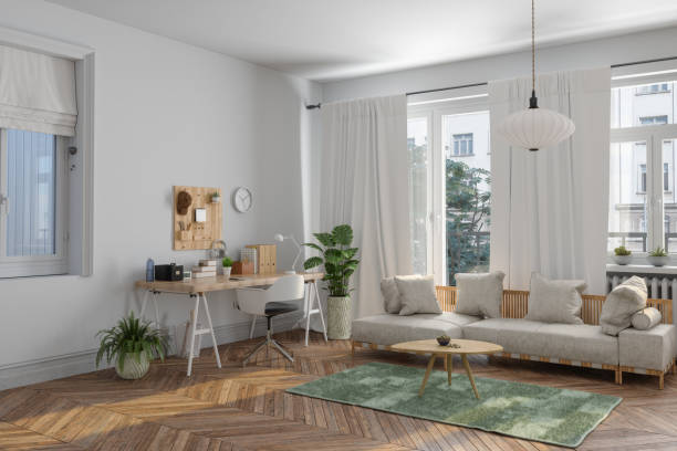 istock Home Office Interior With Wooden Table, Sofa And Potted Plants. Working At Home 1719014074