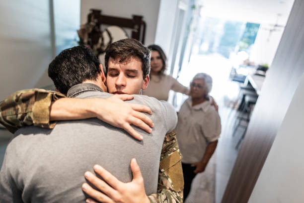 istock Army soldier embracing his father after his return home 1719016629