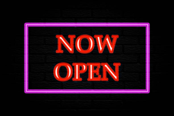 istock Now open. 3d lettering. Neon lights on black brick background. 1719028819