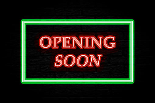 Opening soon. 3d lettering. Neon lights on black brick background.