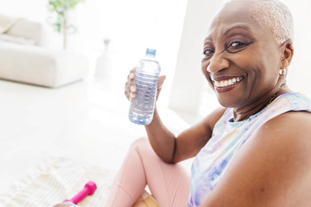 istock Senior Woman With Water After a Workout 1719048867