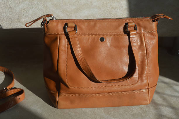 istock women's red leather bag. a modern accessory, a background for decoration. 1719063406